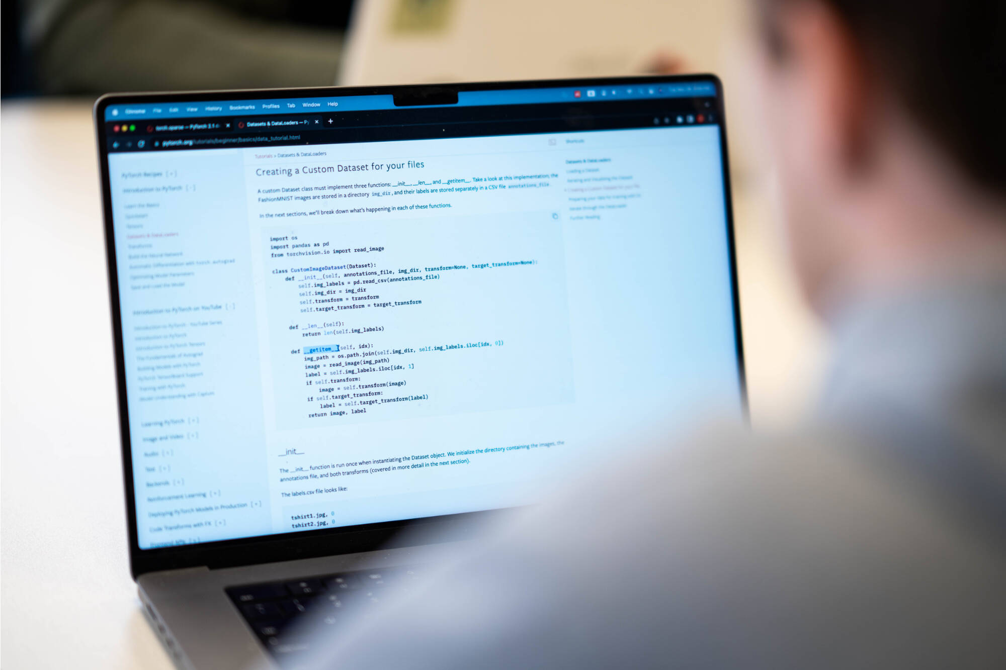 Laptop screen with developer code